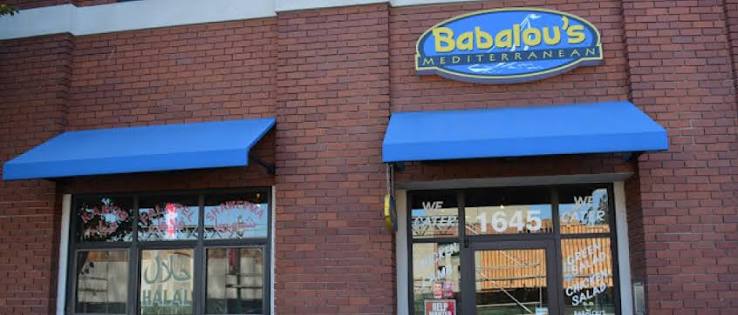 Babalou's storefront on Bonanza Street with blue awnings