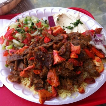 Gyro plate with rice, salad and hummus