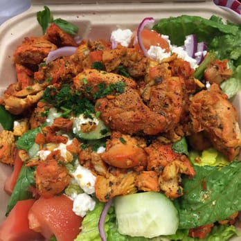 Mediterranean chicken salad with feta and vegetables